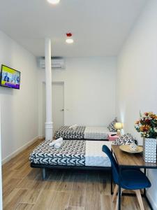 Televízia a/alebo spoločenská miestnosť v ubytovaní HOSTEL COSTA-LUZ Béjar 28-30