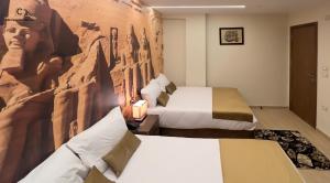Χώρος καθιστικού στο Celia Pyramids View inn