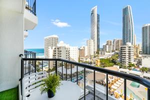 a balcony with a view of the city at Gorgeous Studio right in the heart of Surfers in Gold Coast