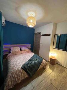 Postel nebo postele na pokoji v ubytování MonÉTOILE charmant bas de villa + 7 fotografií