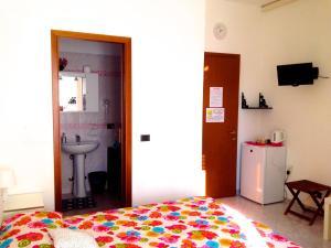 Postel nebo postele na pokoji v ubytování Top Suit Uno - Guest house