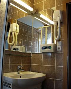 Un baño de Hotel Smaragd