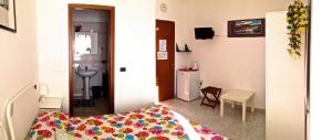Postel nebo postele na pokoji v ubytování Top Suit Uno - Guest house