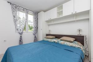 Ένα ή περισσότερα κρεβάτια σε δωμάτιο στο Modern flat in Rijeka
