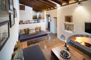 an aerial view of a living room and kitchen at Menexes Suites Monemvasia in Monemvasia