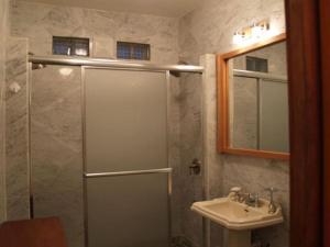 a bathroom with a shower and a sink at Perfect for destination weddings & family vacations! in Arecibo +23 photos