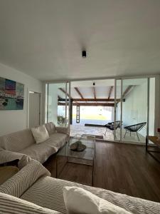 a living room with a couch and a table at laPotrosa in Ayamonte +45 photos