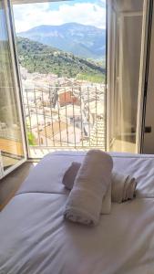 Postel nebo postele na pokoji v ubytování Casa Castillo