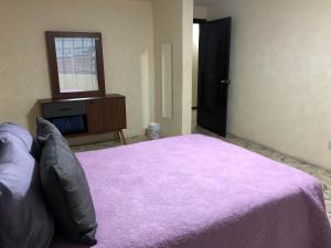 Postel nebo postele na pokoji v ubytování Suites Incoreli, Departamento 4