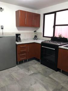 Kuchyň nebo kuchyňský kout v ubytování Suites Incoreli, Departamento 4