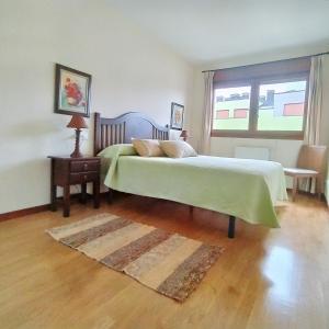 Postel nebo postele na pokoji v ubytování Apartamento Seronda