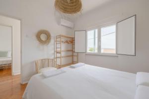 Postel nebo postele na pokoji v ubytování Bento Caraça Terrace