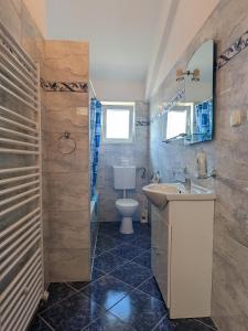 Koupelna v ubytování Apartments with parking space Murter - 5100