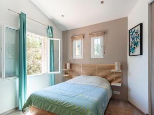 Posteľ alebo postele v izbe v ubytovaní Villa in Vidauban near Vineyards & Beaches + 32 fotografií