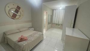 Katil atau katil-katil dalam bilik di Casa Condomínio Cuiabá