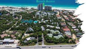 an aerial view of a beach area with a city at Gated Gulf Front Condo in Hidden Dunes Beach & Tennis Resort in Destin