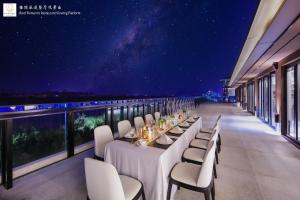 Balkón nebo terasa v ubytování Riverside Wing Hotel Guilin