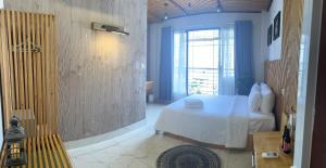 Ένα ή περισσότερα κρεβάτια σε δωμάτιο στο Gemini Saigon APARTMENT