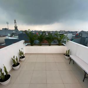 A balcony or terrace at POP Exclusive - Female Only
