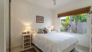 Cascade Links Port Douglas客房内的一张或多张床位