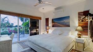 Cascade Links Port Douglas客房内的一张或多张床位
