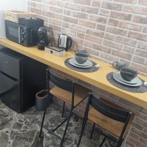 Kuchyň nebo kuchyňský kout v ubytování The loft 27
