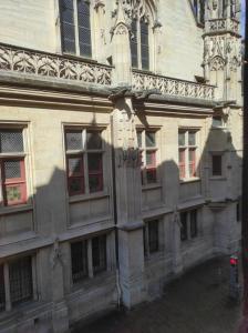 a building with a bunch of windows on the side of it at Studio hypercentre in Rouen +2 photos