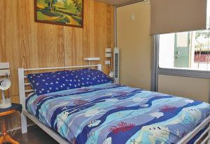 Een bed of bedden in een kamer bij Anchorage