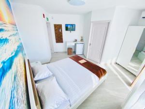Postel nebo postele na pokoji v ubytování IANIS Rooms