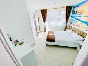 Postel nebo postele na pokoji v ubytování IANIS Rooms