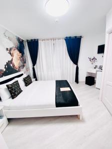 Postel nebo postele na pokoji v ubytování IANIS Rooms