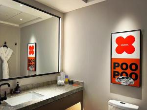 Un baño de Mustel Hotel Knowledge City Guangzhou