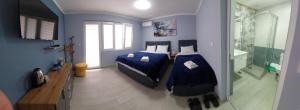 Postel nebo postele na pokoji v ubytování Cholakovi Apartments + 1 fotografie