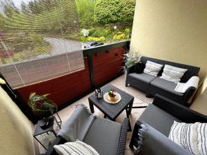 Posedenie v ubytovaní Apartament Klaudia Polanica-Zdrój