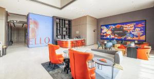 Un lugar para sentarse en Mustel Hotel Knowledge City Guangzhou