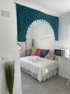 Postel nebo postele na pokoji v ubytování Levante by Mintaka Homes