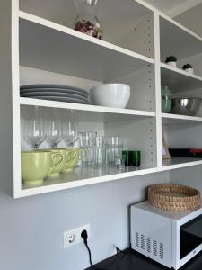 Kuchyň nebo kuchyňský kout v ubytování Apartamenti Jēkabpilī