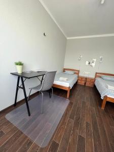 Postel nebo postele na pokoji v ubytování Apartamenti Jēkabpilī