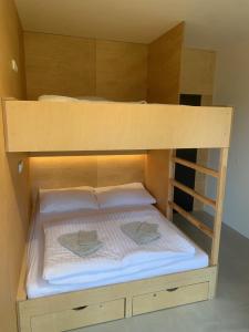 Postel nebo postele na pokoji v ubytování Apartmány na Plešivci + 33 fotografií
