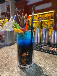 a blue drink sitting on top of a counter at Ataşehir Kurucesme Palace in Istanbul +36 photos