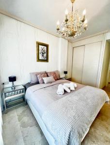מיטה או מיטות בחדר ב-Estrella Albir lujo