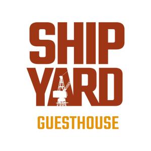um logótipo para o farol de guernsey do estaleiro em Shipyard Guesthouse em Elsfleth