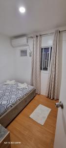 Postel nebo postele na pokoji v ubytování Yuna Homestay - Furnished Home in Butuan