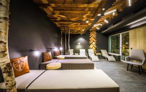 Część wypoczynkowa w obiekcie 24 by AvenidA - Mountain Hotel