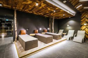 Część wypoczynkowa w obiekcie 24 by AvenidA - Mountain Hotel