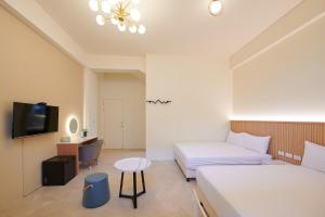 Voodi või voodid majutusasutuse Avenue B&B toas