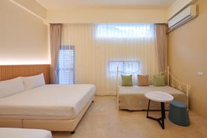 Voodi või voodid majutusasutuse Avenue B&B toas