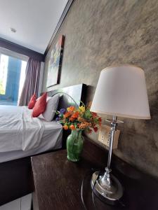 Postel nebo postele na pokoji v ubytování Sea Boss Homestay