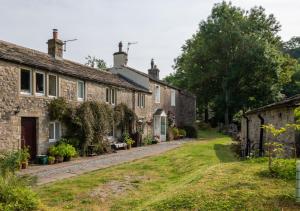 a row of cottages in a village at Long View in Kettlewell