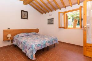 Postel nebo postele na pokoji v ubytování Residenza Miramare - HelloElba